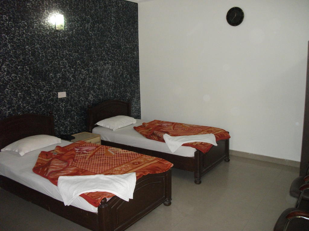 Shalimar Hotel Nueva Delhi Habitación foto